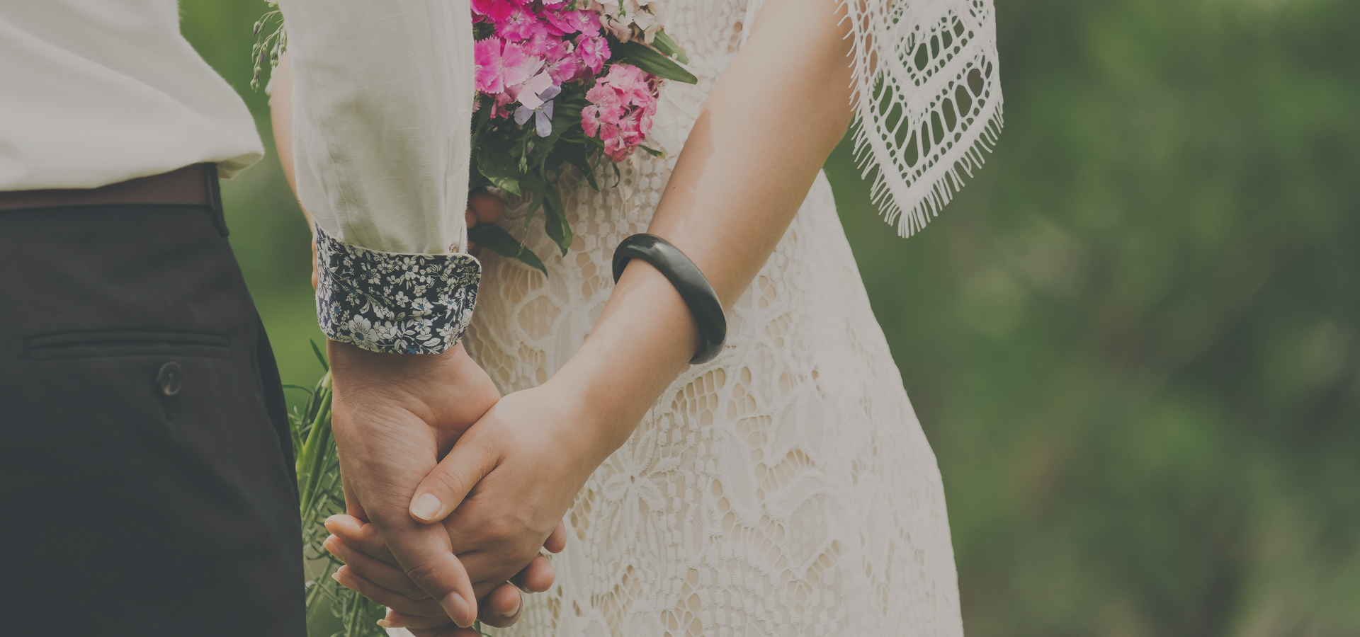 main visual - bride and groom with boquet