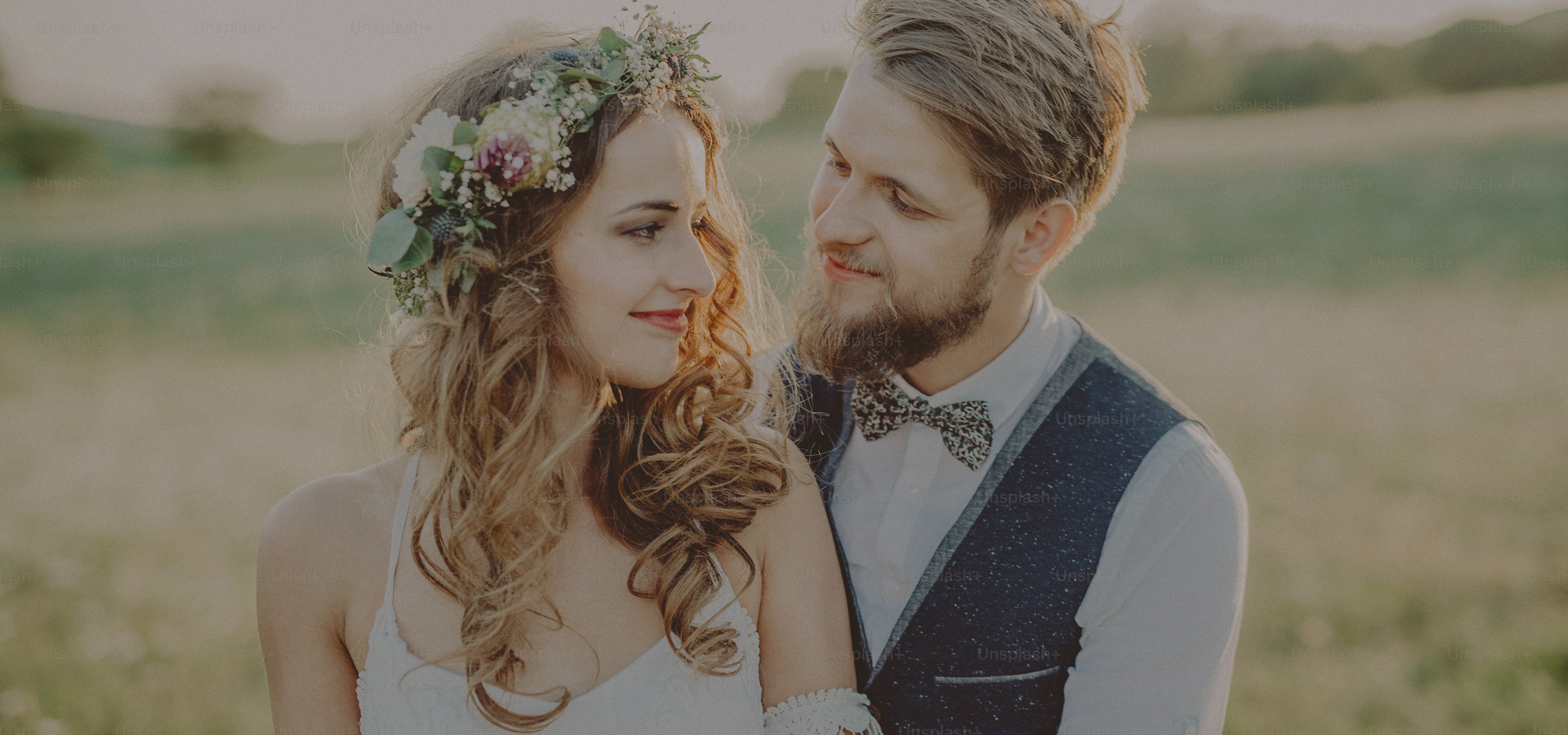 main visual - bride in wedding dress and groom in tux
